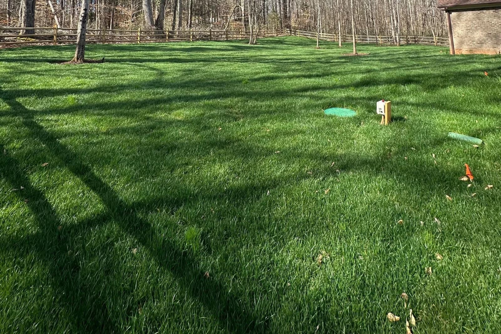 Completed lawn after leveling and sod installation at the Mint Hill project